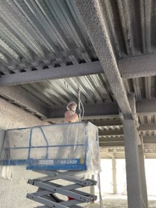 spray fireproofing application in building