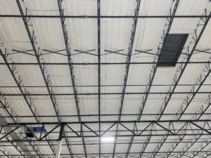 insulation installed on ceiling of warehouse