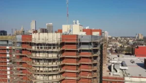 Liquid Air Barrier installed on a high-rise building in a city.