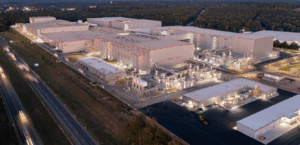 A pharma manufacturing plant overhead view at night.